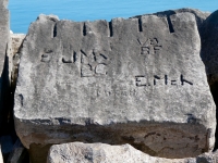 Autograph rock: E, JMK, BC, F, VB, BF, Mitch, E.Mch. Chicago lakefront stone carvings, south of La Rabida Hospital. 2025 Autograph rock: E, JMK, BC, F, VB, BF, Mitch, E.Mch. Chicago lakefront stone carvings, south of La Rabida Hospital. 2025