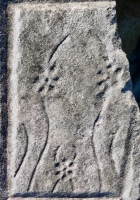 Odd figure, detail, from 12-panel carving. Chicago Lakefront stone carvings, south of La Rabida Hospital. 2025 Odd figure, detail, from 12-panel carving. Chicago Lakefront stone carvings, south of La Rabida Hospital. 2025