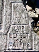 Odd figure, This Fair Defect of Nature, from 12-panel carving. "This fair defect of nature" is from Paradise Lost and refers to the creation of women. Chicago Lakefront stone carvings, south of La Rabida Hospital. 2025 Odd figure, This Fair Defect of Nature, from 12-panel carving. "This fair defect of nature" is from Paradise Lost and refers to the creation of women. Chicago Lakefront stone carvings, south of La Rabida Hospital. 2025