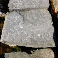 Tom Speilman. Chicago lakefront stone carvings, Rainbow Beach jetty. 2022