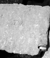 J.V., Dennie(?) G Ann W 69, cross with indecipherable letters. Chicago lakefront stone carvings, Rainbow Beach jetty. 2022 J.V., Dennie(?) G Ann W 69, cross with indecipherable letters. Chicago lakefront stone carvings, Rainbow Beach jetty. 2022