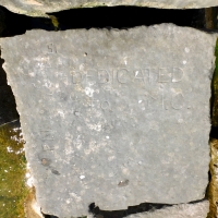 Dedicated to M.C., PN, Si. Chicago lakefront stone carvings, Rainbow Beach jetty. 2022