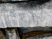 George "54," John Slawnik, detail. Chicago lakefront stone carvings, Rainbow Beach jetty. 2019