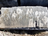 Greek lettering. Chicago lakefront stone carvings, Rainbow Beach. 2019