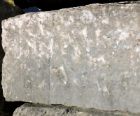 Carm + Karen, Den, X, MOI_GLG(?). Chicago lakefront  stone carvings, Rainbow Beach jetty. 2022