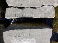 Glenn + Joyce, MS, PM, TF. Chicago lakefront stone carvings, Rainbow Beach jetty. 2022