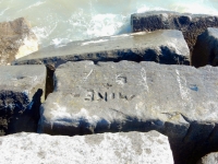 Mike + L. Chicago lakefront stone carvings, Rainbow Beach. 2019