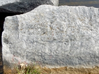 George 59, YU, arrow or rocket. Chicago lakefront stone carvings, Rainbow Beach North. 2019