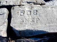 Bob, C, Shep. Chicago lakefront stone carvings, Rainbow Beach. 2019