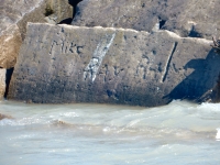 Mike, Ray, R+M, JF, D, John. Chicago lakefront stone carvings, Rainbow Beach. 2019