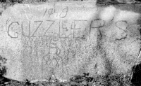 Bottle, 1948 "Guzzler's", Ed, Doc. Chicago lakefront stone carvings, 75th Street and Rainbow Beach. 2019