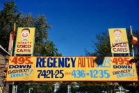 The artist made sure that all the faces were looking in the right direction. Regency Auto Sales automotive art environment, Western Avenue at 75th Street. Photos circa 1990