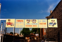 Tom's Auto Mart, Western Avenue at 74th Street. Photos circa 1990