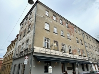 Building with wear and tear and interesting painting, Krakow