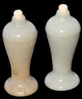 A hint of classical elegance in the vase-like forms and marbleized plastic A hint of classical elegance in the vase-like forms and marbleized plastic