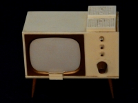 Another S&P that encodes a whole cultural moment. Television seemed as transformative in its time as the Internet is now. (Where are the Web browser S&Ps?) The actual spice holders are raised and lowered with a twist of the volume nob. The little piece below the screen lets you place a picture there. But the noise from this digital file provides a perfect representation of what the screen often looked like on these old sets -- random bits of color floating in a sea of static. Another S&P that encodes a whole cultural moment. Television seemed as transformative in its time as the Internet is now. (Where are the Web browser S&Ps?) The actual spice holders are raised and lowered with a twist of the volume nob. The little piece below the screen lets you place a picture there. But the noise from this digital file provides a perfect representation of what the screen often looked like on these old sets -- random bits of color floating in a sea of static.
