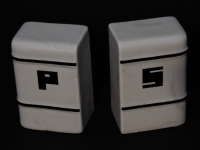 These two larger ceramic shakers came with ovens, so their look fit in with a larger industrial desgin that was meant to communicate solidity and cleanliness.