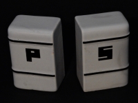 These two larger ceramic shakers came with ovens, so their look fit in with a larger industrial desgin that was meant to communicate solidity and cleanliness. These two larger ceramic shakers came with ovens, so their look fit in with a larger industrial desgin that was meant to communicate solidity and cleanliness.