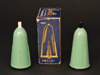 Art deco in miniature. The illustration makes them full-fledged skyscrapers. Sonette salt & pepper dispensers