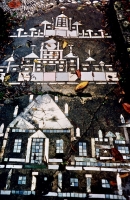 Building sidewalk mosaics, Howard Finster's Paradise Garden, circa 1990