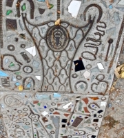 Metal and ceramic items embedded in sidewalk, detail, Howard Finster's Paradise Garden, 2016