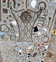 Metal and ceramic items embedded in sidewalk, detail, Howard Finster's Paradise Garden, 2016 Metal and ceramic items embedded in sidewalk, detail, Howard Finster's Paradise Garden, 2016
