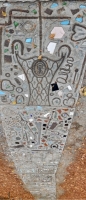 Metal and ceramic items embedded in sidewalk, Howard Finster's Paradise Garden, 2016 Metal and ceramic items embedded in sidewalk, Howard Finster's Paradise Garden, 2016