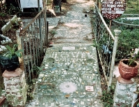 Long view of sidewalk, Howard Finster's Paradise Garden, circa 1990