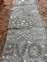 Sidewalk with embedded words, Howard Finster's Paradise Garden, 2016