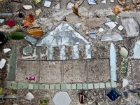 Building sidewalk mosaic, detail, Howard Finster's Paradise Garden, 2016 Building sidewalk mosaic, detail, Howard Finster's Paradise Garden, 2016