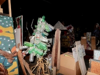 Mose Tollivers, and a giant room full of stuff beyond them, at Souls Grown Deep warehouse, Atlanta