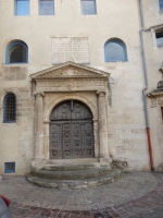 Imposing doorway behind Hotel Dieu, Arles
