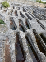 Monks' graves dug into the stone, Abbey of Saint-Roman
