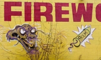 Animal face and rocket, Fireworks store painted wall Animal face and rocket, Fireworks store painted wall