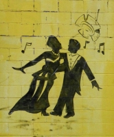 Dancers on wall sign