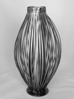 Stanley Szwarc stainless steel vase with thin undecorated strips