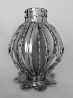 Stanley Szwarc decorated stainless steel vase with bulging middle