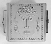 Stanley Szwarc stainless steel face box with hair and earrings