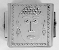 Stanley Szwarc stainless steel face box with hair and earrings
