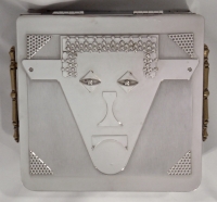 Stanley Szwarc stainless steel face box with bull-like face
