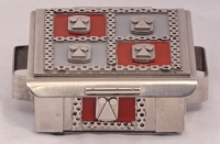 Stanley Szwarc stainless steel face box with four faces on red and blue backgrounds, front view