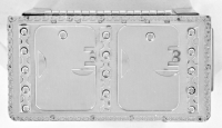 Stanley Szwarc stainless steel face box with two abstract profiles