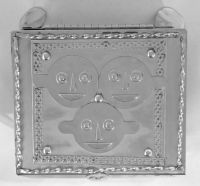 Stanley Szwarc stainless steel face box three cartoonish faces