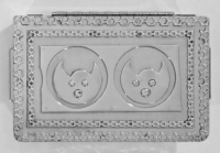 Stanley Szwarc stainless steel face box with two bat-like faces