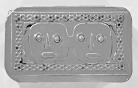 Stanley Szwarc stainless steel small face box with two faces with triangle noses