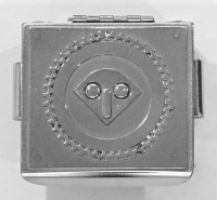 Stanley Szwarc stainless steel face box with small geometric face