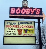 Booby's triple-threat sign: gyros, neon and a dead ringer for the late Illinois Sen. Paul Simon. Milwaukee Avenue, Niles Booby's triple-threat sign: gyros, neon and a dead ringer for the late Illinois Sen. Paul Simon. Milwaukee Avenue, Niles
