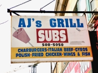 AJ's Grill, Broadway at Hood. Gone