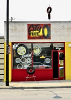 Facade with painted signs and two tires on a pole, City Tire, Lincoln near Carmen, Chicago-Roadside Art