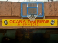 Basketball hoop and sign for Ocana Tire Repair, Clark Street near Gregory, Chicago-Roadside Art